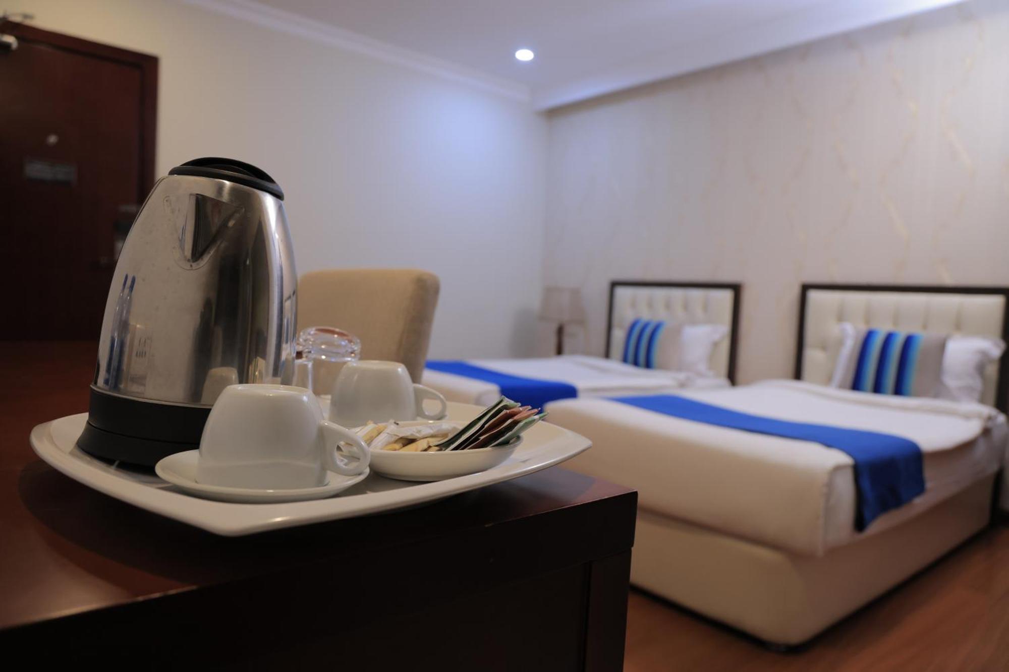 Tolip Olympia Hotel Adís Abeba Habitación foto